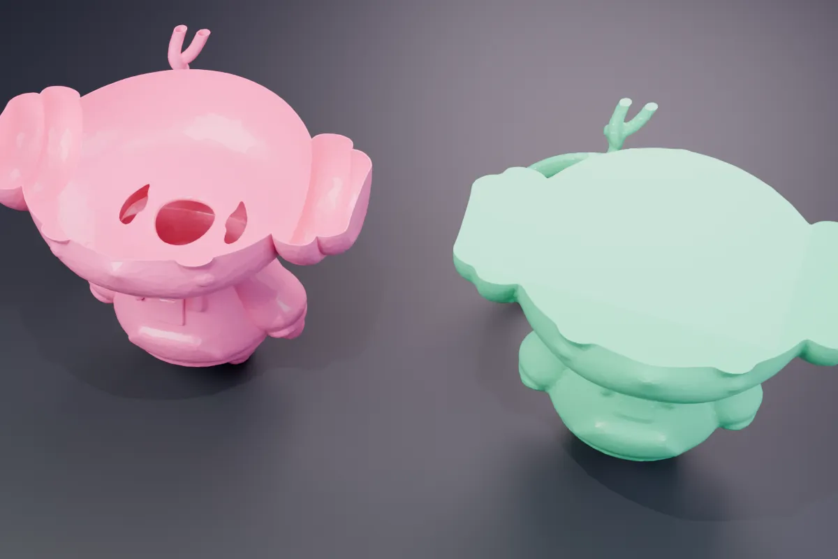 Two lower halves of the same figurine, cut by our tool at the same height. The pink one, cut from the model as generated, is a hollow shell with nothing inside the cut. The green one, cut after a voxel remesh, has a solid flat cut face.